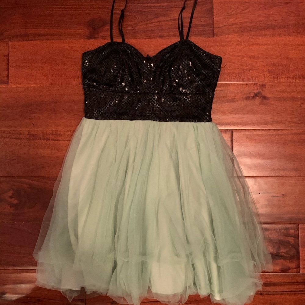 Juniors sage green and black sequence party dress.